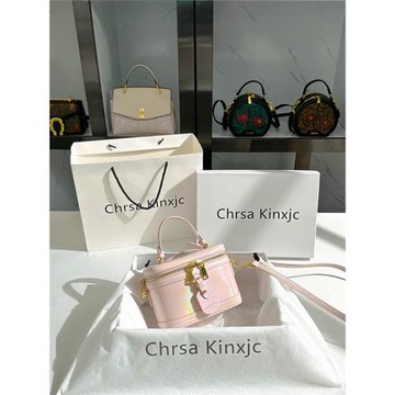 Chrsa Kinxjc真皮高級感化妝盒子包包女2025新款粉紅色鐳射水桶包