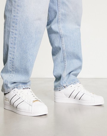 adidas Originals Superstar trainers in white with contrast stripes