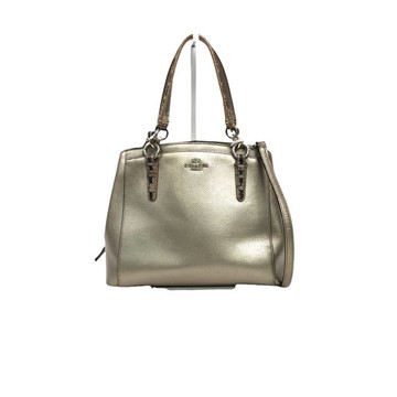 coach黃色金屬光澤皮革手提包