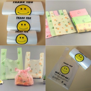 現貨《塑膠袋W1W3W4C11】50入 微笑背心袋 彩色塑膠袋 打包袋 塑料袋 ♥ 手提袋 開店用品 攤販 購物袋 超市
