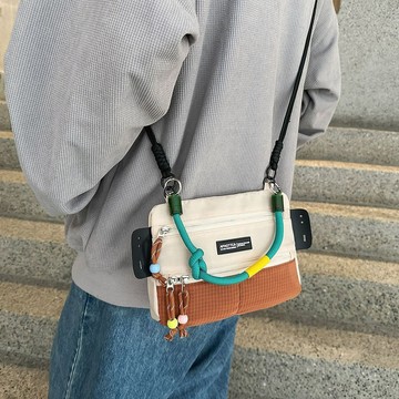 免運🔥本土發貨2025情侶新款輕便斜挎包女時尚休閒單肩手機包戶外運動百搭小包包