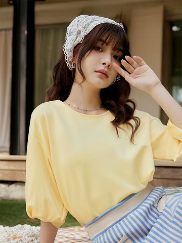 寬鬆落肩扭結袖上衣