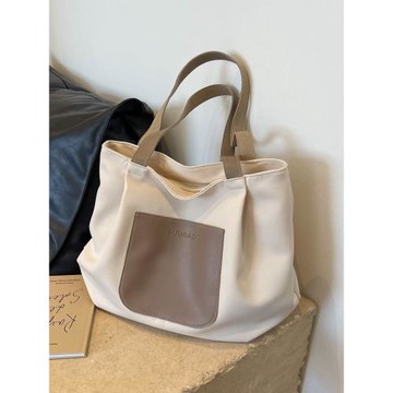 休閑大容量包包女2025新款簡約百搭通勤單肩帆布托特包輕便旅行包