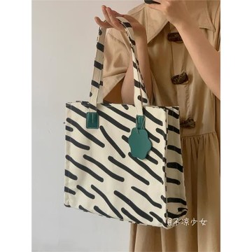 大容量通勤包日系ins風學生小眾百搭帆布包斑馬紋簡約單肩托特包