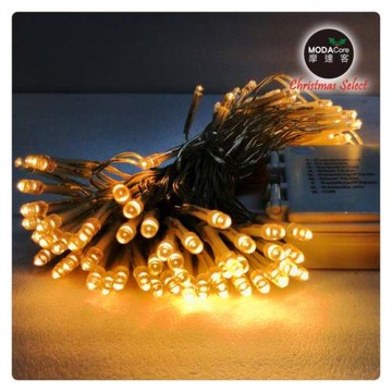 摩達客-聖誕燈 LED燈串100燈電池燈 (暖白光/透明線） (高亮度又環保)