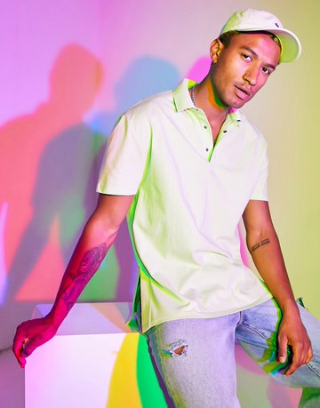 ASOS DESIGN relaxed polo with rib collar and side splits in green