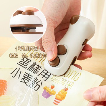 臺灣出貨12H🌈貓咪迷你封口機新款小型便攜零食神器家用手壓式塑料袋密封真空器