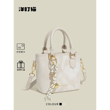洋叮貓簡約時尚高級感手提水桶包包女2025新款通勤百搭單肩斜挎包
