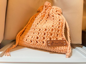 毛線純手工勾織小型鏤空束口袋