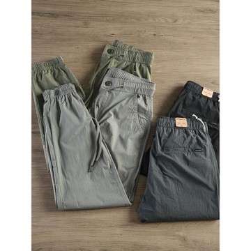 夏季薄款男速干束腳休閑褲輕薄透氣涼爽快干空調長褲純色戶外潮流