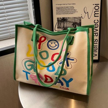 休閑大容量包包女秋冬百搭帆布包通勤單肩包小眾托特包手提媽咪包