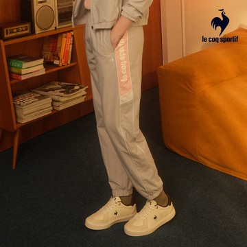 【LE COQ SPORTIF 法國公雞】女款藍灰色防潑水平織運動長褲LWW82271