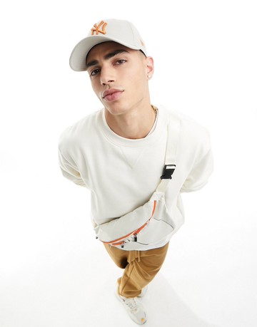 ASOS DESIGN heavyweight oversized sweatshirt in cream-White