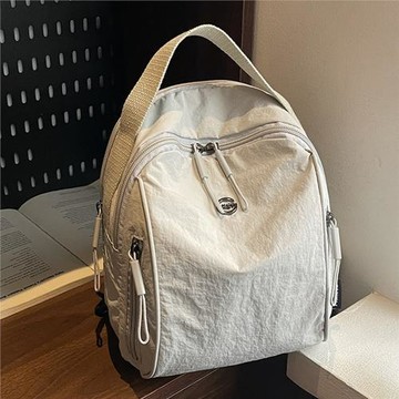 新款潮通勤防水時尚休閑尼龍布雙肩包女大容量旅行大學生書包胸包