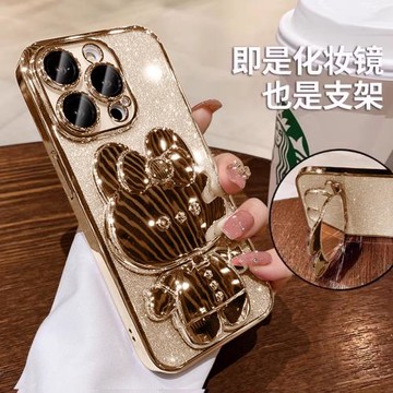 適用蘋果16promax手機殼新款隱形補妝鏡支架iphone15pro帶鏡頭膜漸變閃粉plus高級感全包防摔卡通