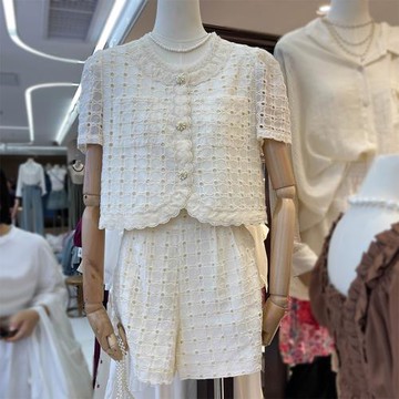 十三行夏季圓領設計感法式休閑小眾純色繡花鏤空上衣高腰套裝女