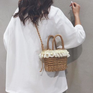 夏天海邊沙灘度假法式草編包包女2025新款手提水桶包編織斜挎小包
