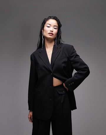 Topshop Tailored oversized blazer with twisted sleeve in black