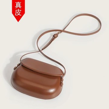 香港專柜放手機休閑純色小包包女2025新款小眾百搭斜挎貝殼馬鞍包