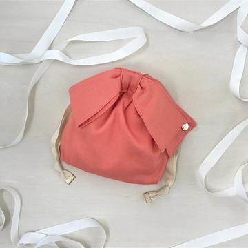 全新亞麻斜紋布不對稱絲帶抽繩手拿包橙