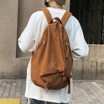 雙肩包男水洗帆布日韓小衆揹包純色復古高級感大容量學生書包男
