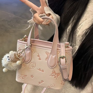 ✨臺灣出貨✨粉色菜籃子包包可愛女2025新款小衆設計高級感潮流斜挎水桶包ins
