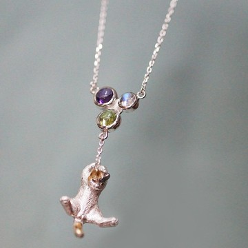 捕捉氣球的印花布吊墜