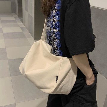 慵懶風帆布大包包女2025新款斜挎腰包ins潮學生布包大容量單肩包