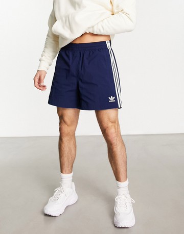 adidas Originals adicolor polyester 3 stripe shorter shorts in navy