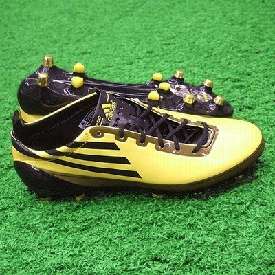 F50 アディゼロ X-TRX SG サン×ブラック×カレッジゴールド