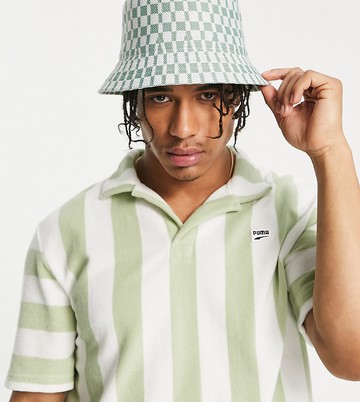 Puma Downtown towelling polo shirt in green stripe - exclusive to ASOS