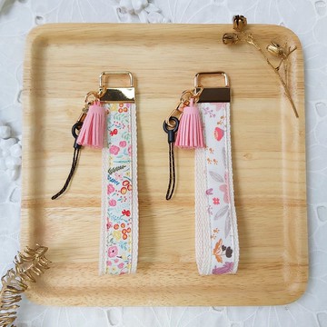 粉紅色系韓國花布流蘇手機防摔手腕帶