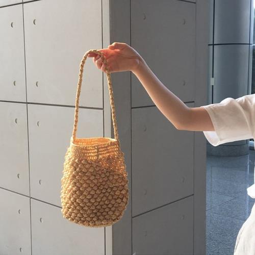 法式編織包女夏手工手織包包單肩草編藤編草包海邊度假沙灘水桶包