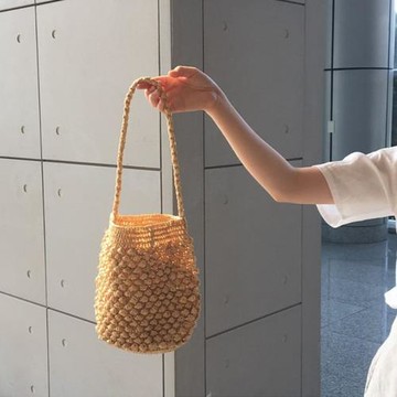 法式編織包女夏手工手織包包單肩草編藤編草包海邊度假沙灘水桶包