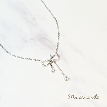【焦糖小姐 Ms caramelo】925純銀鍍K白 蝴蝶結項鍊