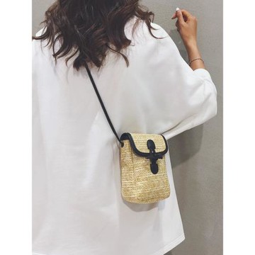 夏天時尚高級感豎款編織手機包包女2025新款小眾迷你草編斜挎小包