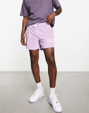 ASOS DESIGN oversized towelling shorts in purple with embroidery
