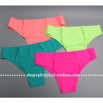 歐美熒光色無痕女內褲糖果色騷粉一片式三角褲健身房性感冰絲底褲