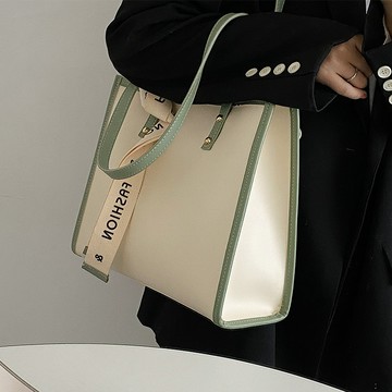 免運🏆小衆單肩大包包女2025新款大學上課託特包百搭大容量通懃包高級感側背包 斜背包 託特包 水桶包 乞丐包 韓國包包