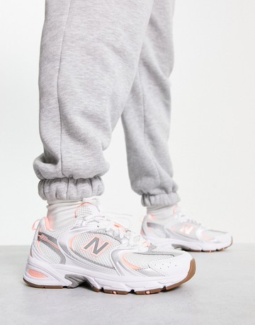 New Balance 530 trainers in white & pink