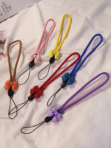 手機掛繩短款手工編織手腕帶子可調節創意網紅蝴蝶結掛飾手機殼通用吊繩防丟掛鏈