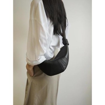 網紅牛角包女斜挎餃子包高級質感可頌包羊皮羊角包小眾真皮單肩包