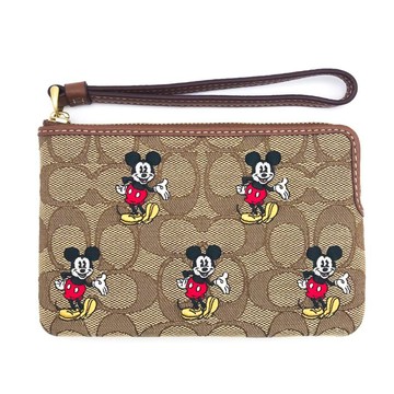 【COACH】印花防刮PVC皮革L型拉鍊手拿包-迪士尼