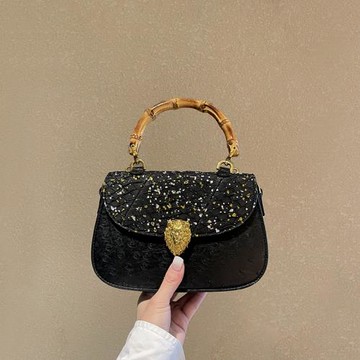 工廠直銷竹節馬鞍包女2025春夏新款駝鳥紋真皮手提女包設計師同款