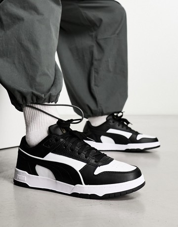 Puma Rebound trainers in black & white