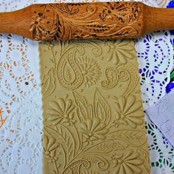 擀麵杖浮雕，雕刻擀麵杖，手工製作的擀麵杖，圖案羅林