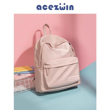 原創小眾馬卡龍莫蘭迪色簡約純色雙肩包女大學生書包背包輕便日系