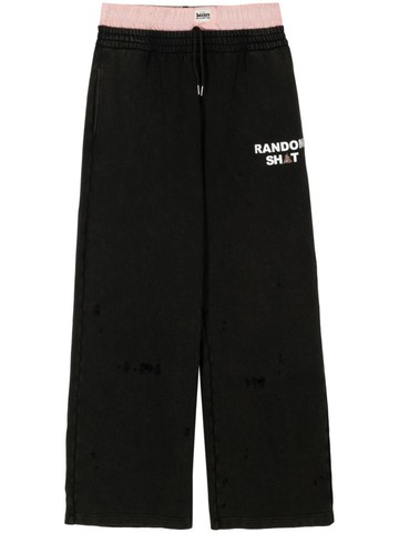 Natasha Zinko - layered logo-print trousers - unisex - Cotton - XS - Black
