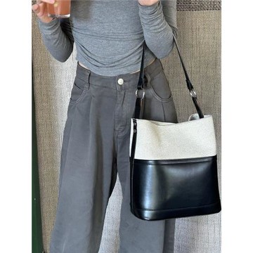 白緹雅精致拼色休閑包包女2025新款輕奢高級水桶包百搭單肩斜挎包