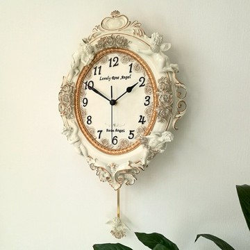 歐式田園藝術掛鐘客廳天使臥室墻面掛表裝飾靜音創意樹脂壁鐘熱賣